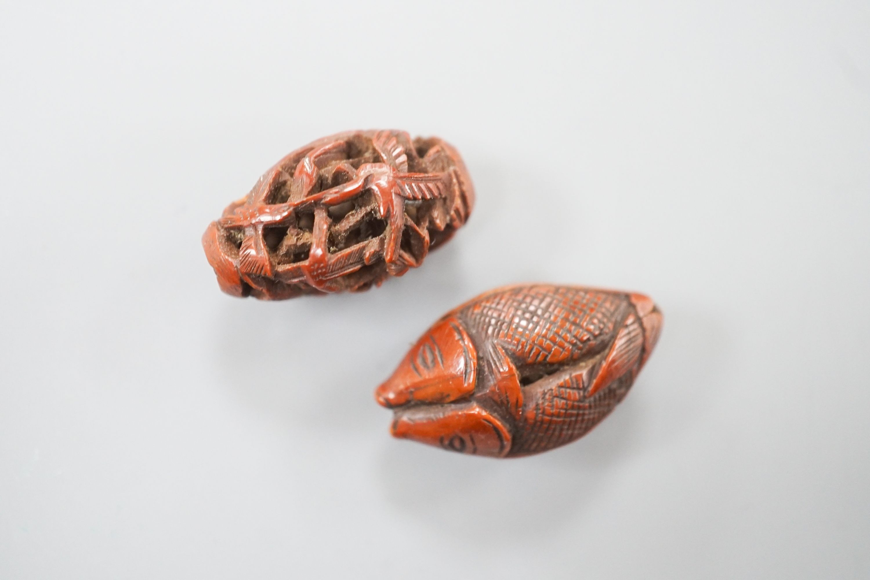 Two Chinese peach stone carvings